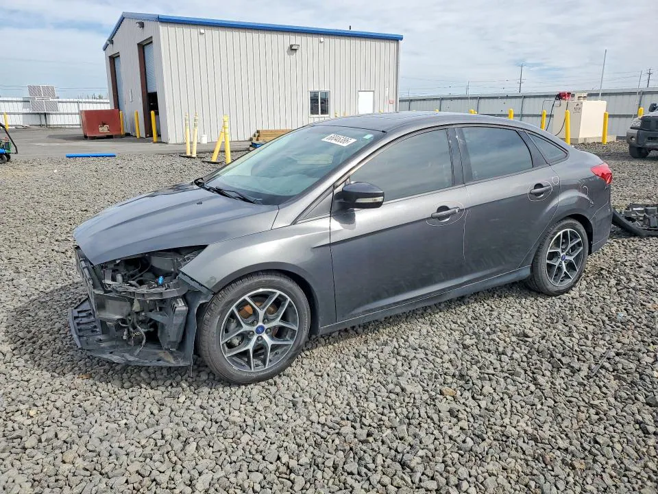 2017 Ford Focus VIN 1FADP3H26HL304180 фото 1