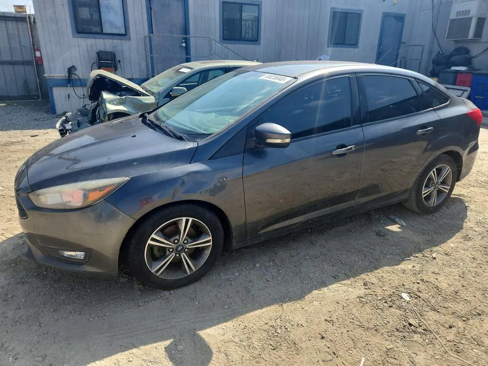 2017 Ford Focus VIN 1FADP3FE5HL306919 фото 1
