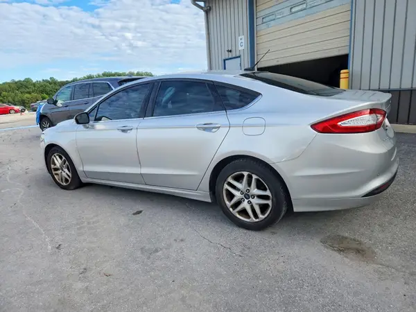 3FA6P0H71GR237202 — 2016 Ford Fusion, фото 2 с аукциона Copart 08.10.2026, Боковая часть