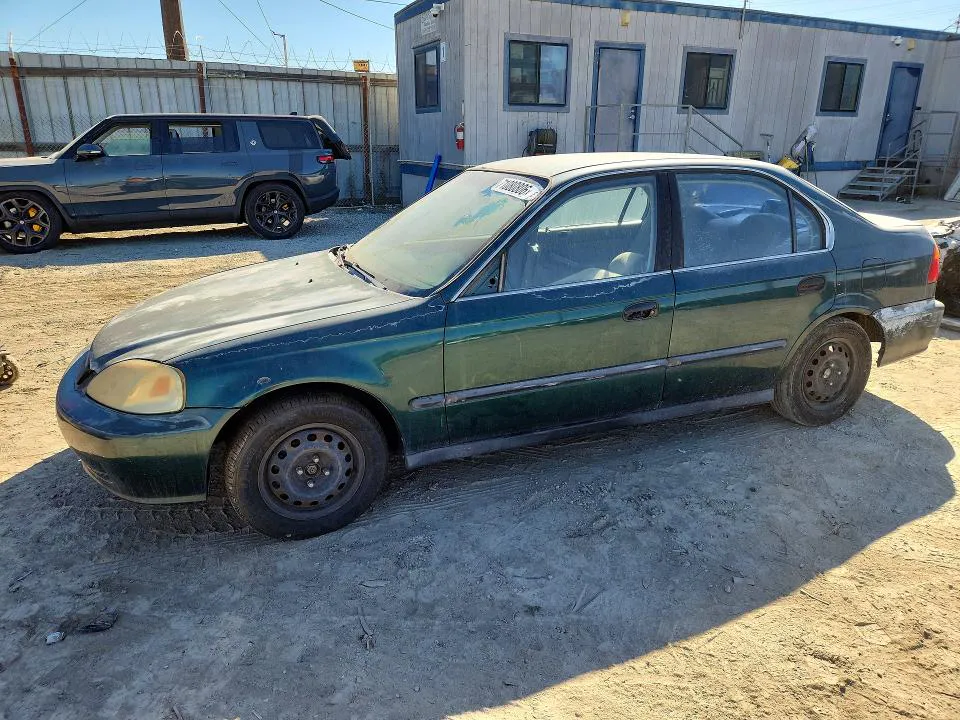 1999 HONDA CIVIC VIN JHMEJ6576XS000934 фото 1