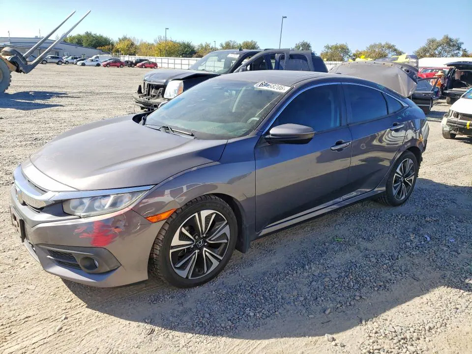 2016 Honda Civic VIN 2HGFC1F32GH654496 фото 1