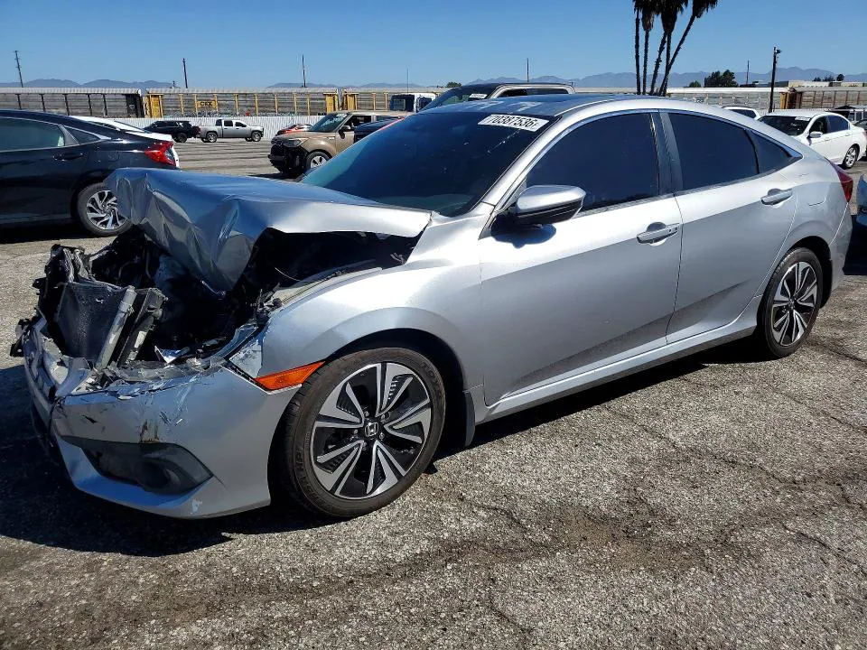 2016 Honda Civic VIN 2HGFC1F45GH650080 фото 1