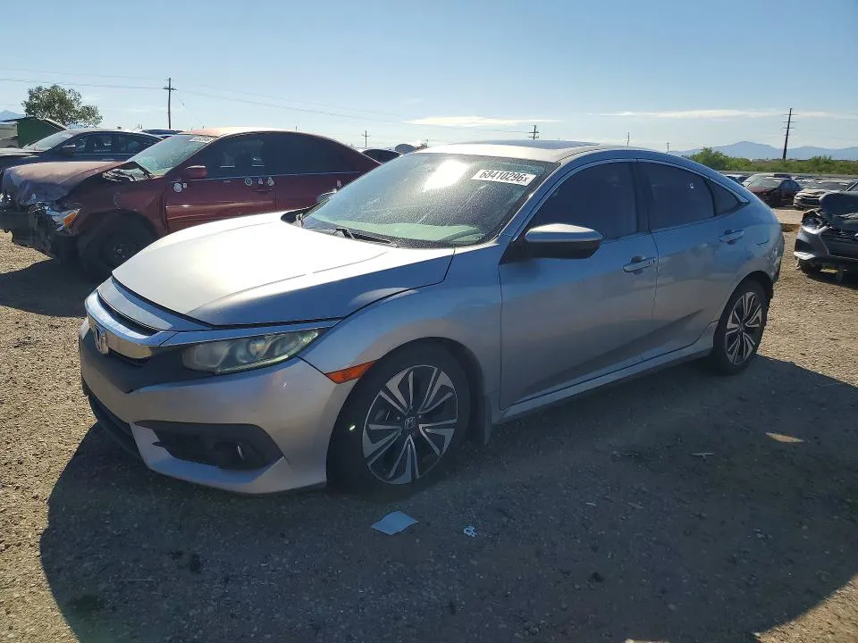 2017 Honda Civic VIN 19XFC1F3XHE031140 фото 1