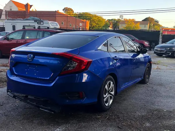 19XFC2F54JE205555 — 2018 Honda Civic, фото 4 с аукциона Copart 08.10.2026, Повреждения со всех сторон