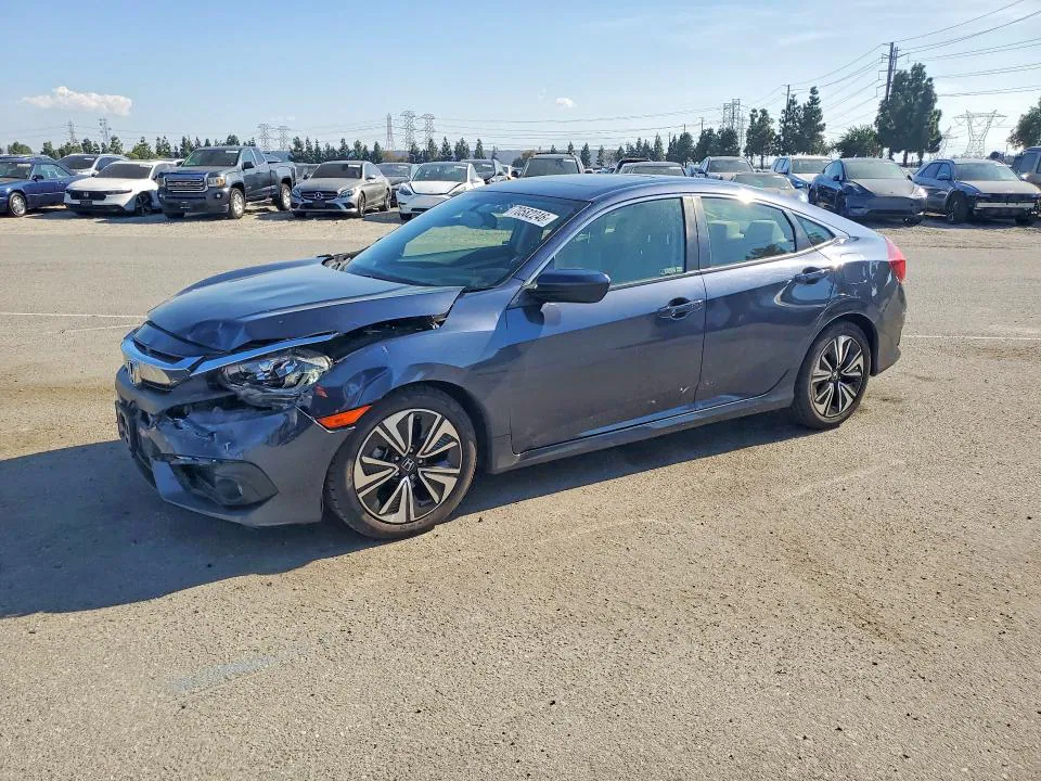 2018 Honda Civic VIN JHMFC1F31JX015865 фото 1