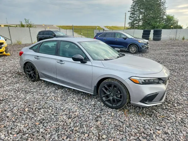 2HGFE2F51NH538690 — 2022 Honda Civic, фото 4 с аукциона Copart, Боковая часть