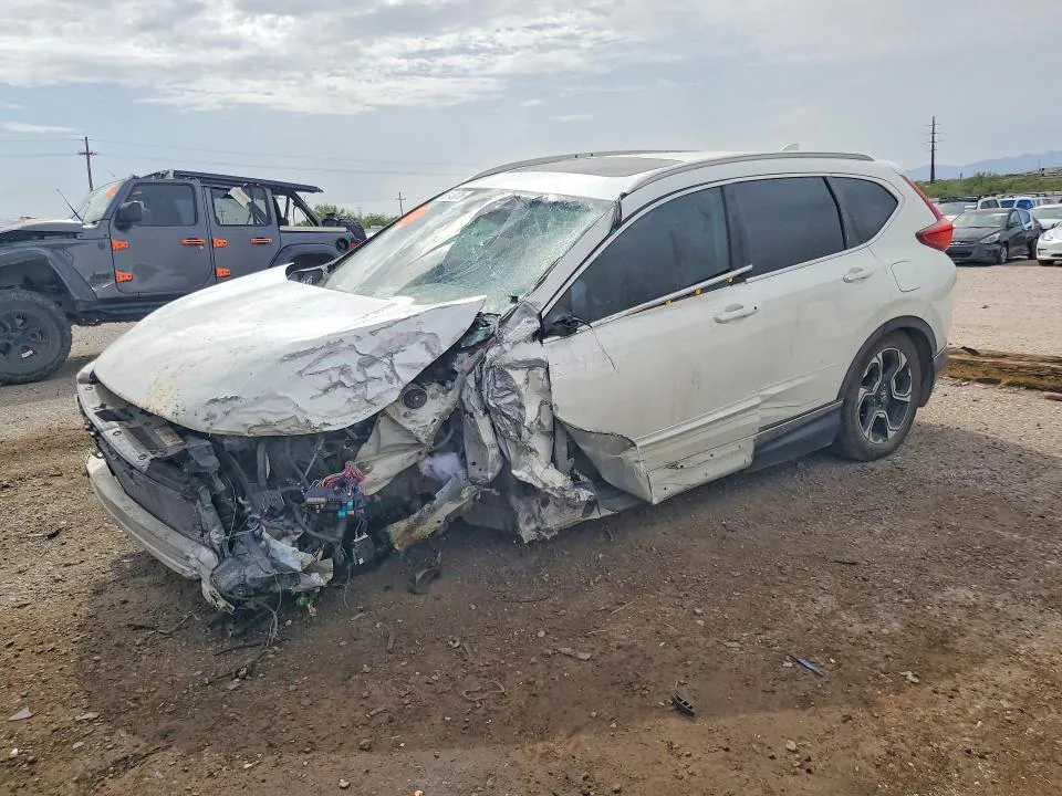 2017 Honda CR-V VIN 2HKRW1H93HH517130 фото 1
