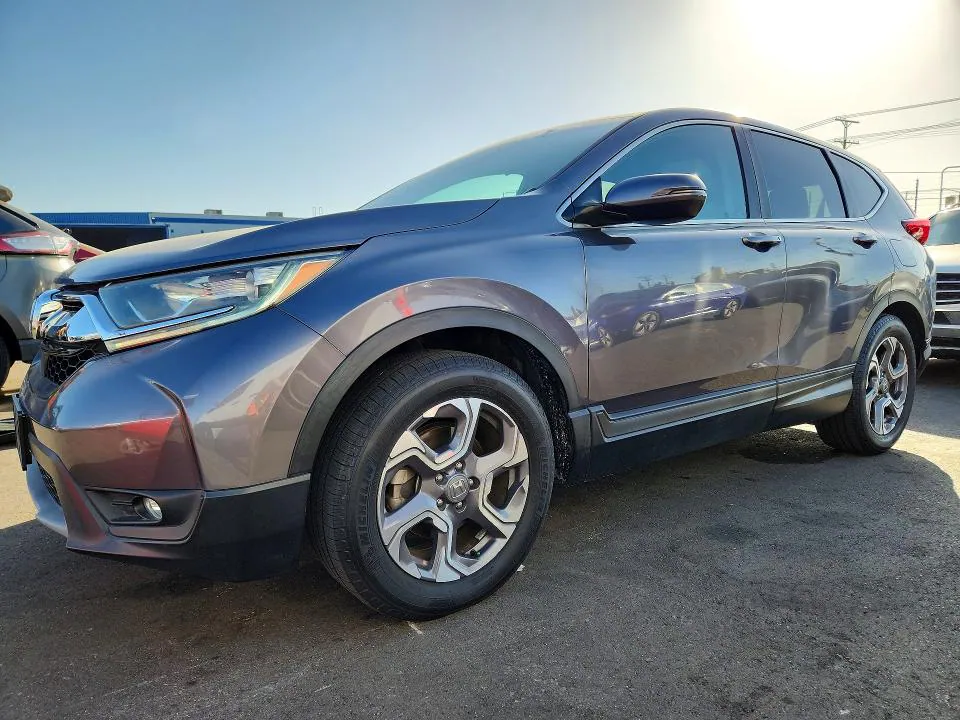 2017 Honda CR-V VIN 7FARW1H5XHE010726 фото 1