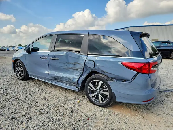 5FNRL6H82PB070381 — 2023 Honda Odyssey, фото 2 с аукциона Copart, Боковая часть