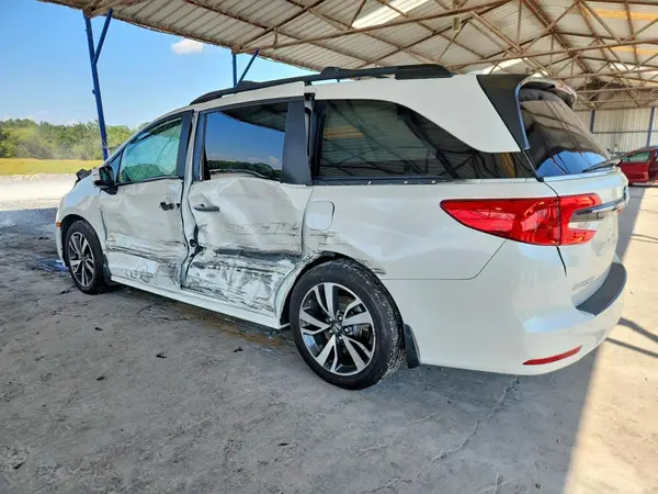 5FNRL6H88PB019810 — 2023 Honda Odyssey, фото 2 с аукциона Copart, Боковая часть