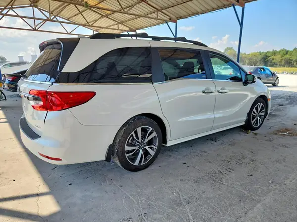 5FNRL6H88PB019810 — 2023 Honda Odyssey, фото 3 с аукциона Copart, Боковая часть