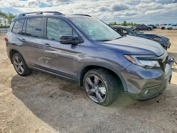 5FNYF8H96MB041484 — 2021 Honda Passport, фото 4 с аукциона Copart, Передняя часть