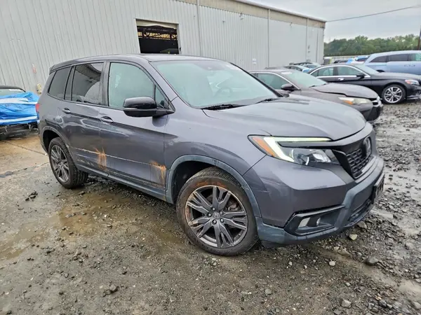 5FNYF8H50MB024449 — 2021 Honda Passport, фото 4 с аукциона Copart, Боковая часть