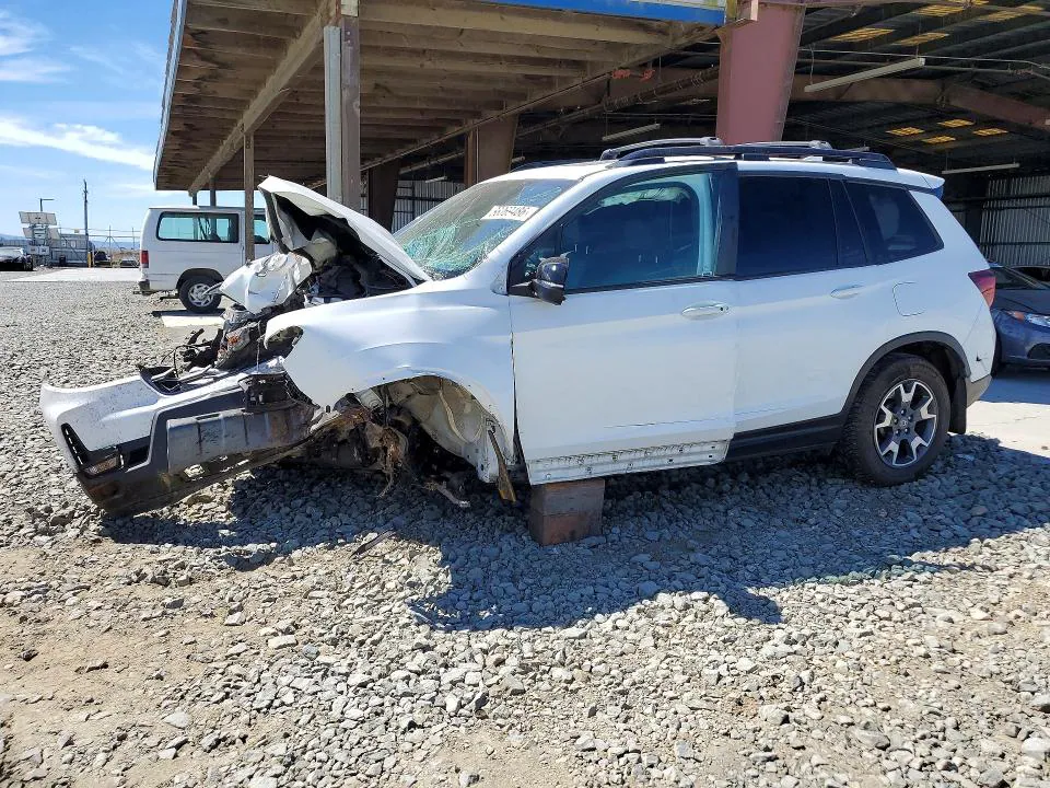 2022 Honda Passport VIN 5FNYF8H6XNB001318 фото 1