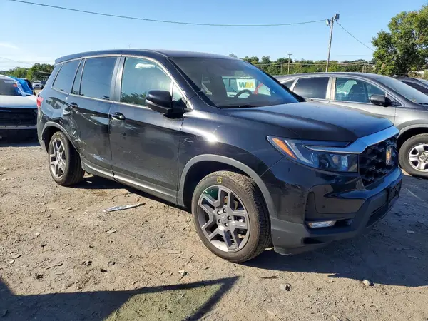 5FNYF8H53NB024642 — 2022 Honda Passport, фото 4 с аукциона Copart, Боковая часть