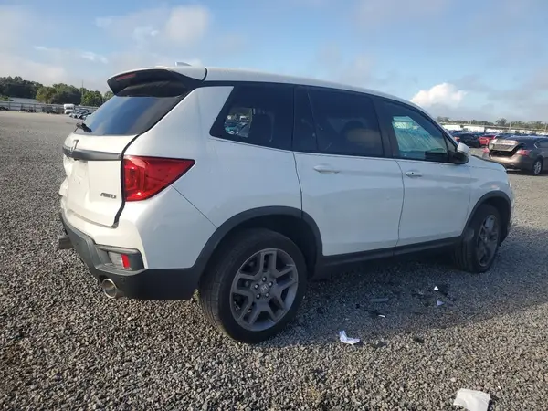 5FNYF8H59PB002759 — 2023 Honda Passport, фото 3 с аукциона Copart, Боковая часть
