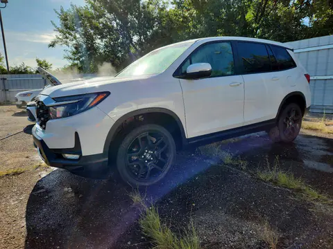 5FNYF8H58RB010080 — 2024 Honda Passport, Подтопление (Water/Flood), фото до ремонта