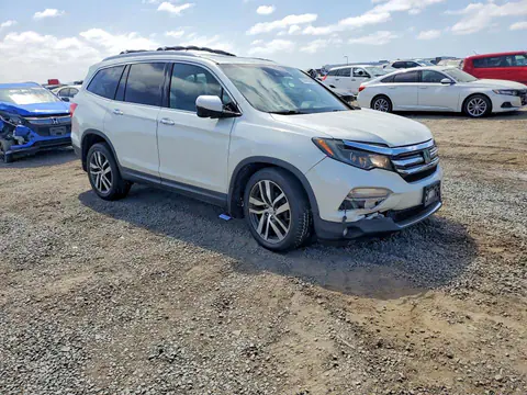 2016 Honda Pilot VIN 5FNYF5H99GB017571 фото 4