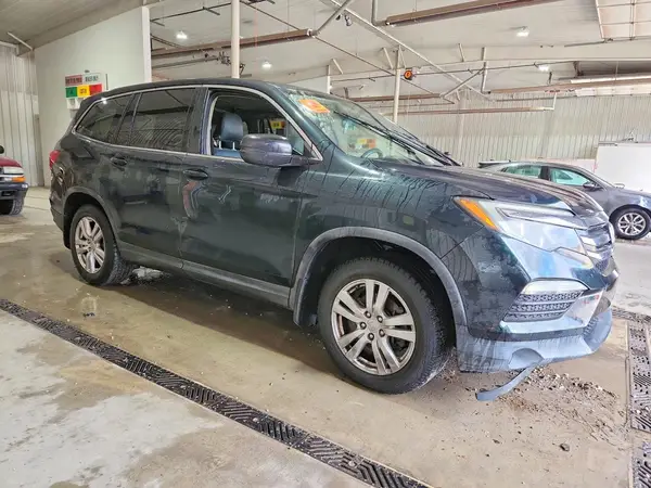 5FNYF6H14GB124852 — 2016 Honda Pilot, фото 4 с аукциона Copart, Подтопление