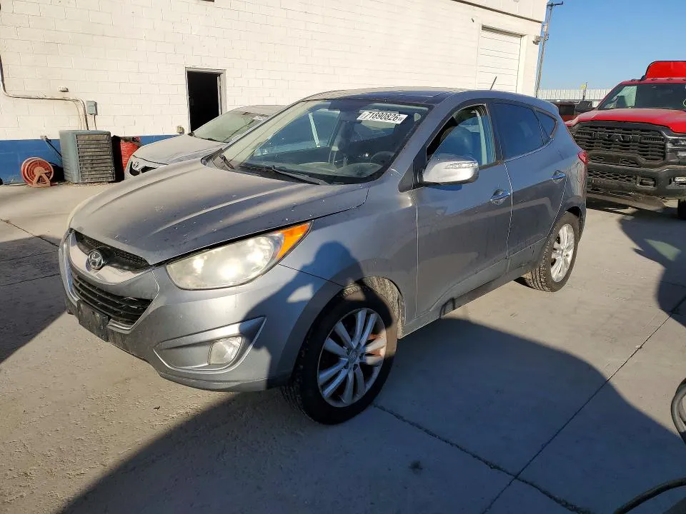 2010 HYUNDAI TUCSON VIN KM8JUCAC1AU034084 фото 1