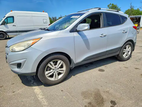 2012 HYUNDAI TUCSON VIN KM8JUCAC8CU395878 фото 1