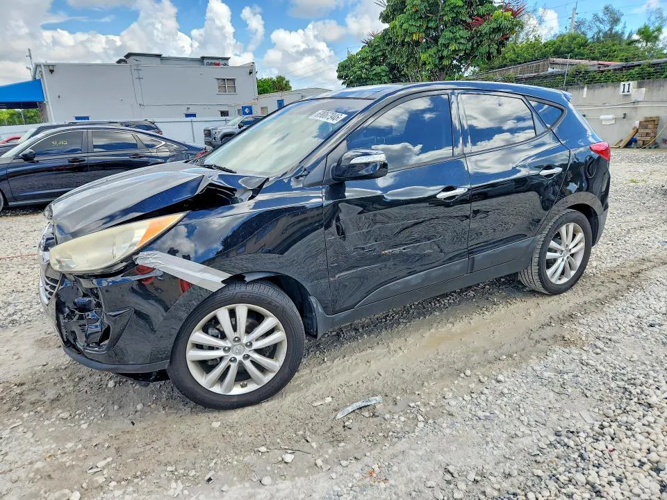 2012 HYUNDAI TUCSON VIN KM8JUCAC1CU537438 фото 1