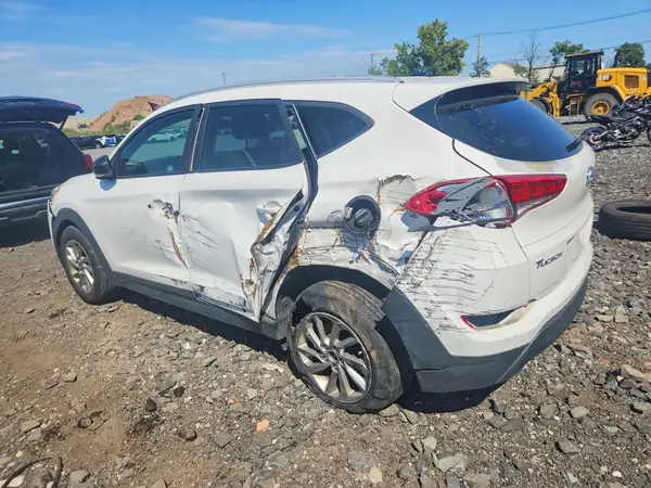 KM8J3CA49GU253184 — 2016 Hyundai Tucson, фото 2 с аукциона Copart, Боковая часть