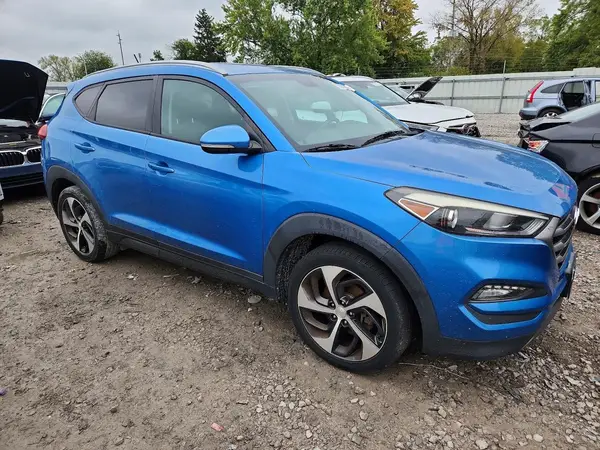 KM8J33A2XGU112932 — 2016 Hyundai Tucson, фото 4 с аукциона Copart 06.10.2026, Боковая часть