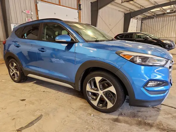 KM8J33A25JU704102 — 2018 Hyundai Tucson, фото 4 с аукциона Copart, Задняя часть