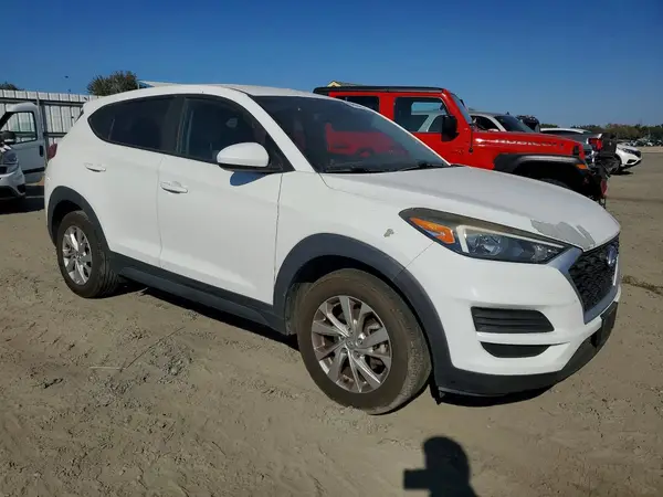 KM8J2CA44KU908492 — 2019 Hyundai Tucson, фото 4 с аукциона Copart, Передняя часть