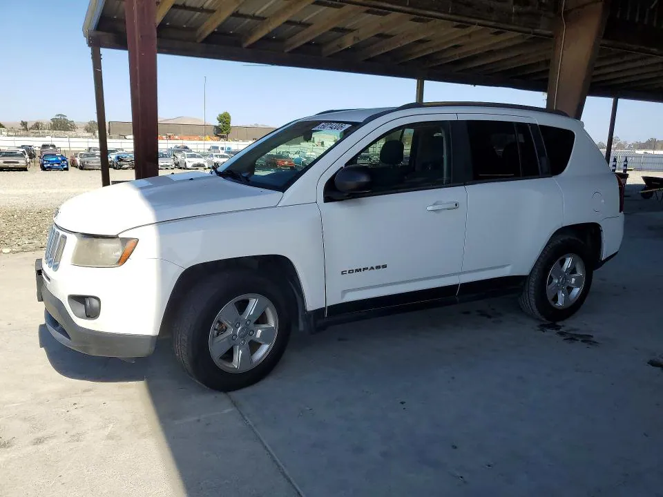 2014 Jeep Compass VIN 1C4NJCBAXED882191 фото 1