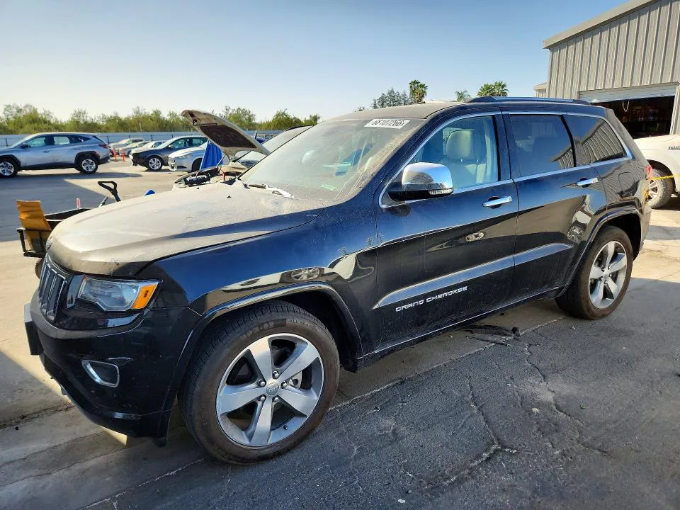 2015 Jeep Grand Cherokee VIN 1C4RJFCG4FC209166 фото 1