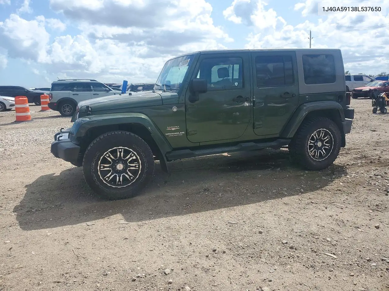 2008 Jeep Wrangler Unlimited Sahara VIN 1J4GA59138L537650 фото 1