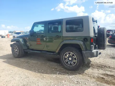 2008 Jeep Wrangler Unlimited Sahara VIN 1J4GA59138L537650 фото 2