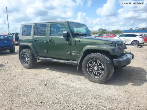 2008 Jeep Wrangler Unlimited Sahara VIN 1J4GA59138L537650 фото 4