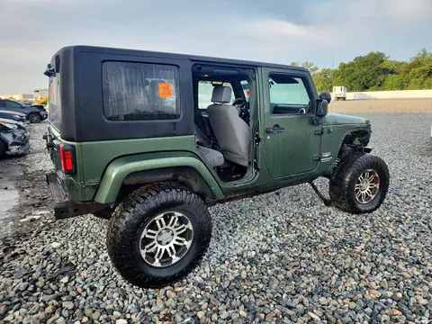 2008 Jeep Wrangler Unlimited Sahara VIN 1J4GA59118L604374 фото 3