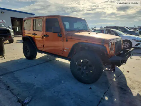 2011 Jeep Wrangler Unlimited Sahara VIN 1J4BA5H13BL604184 фото 4