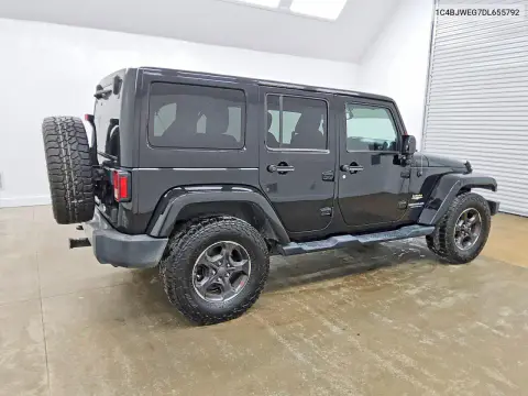 2013 Jeep Wrangler Unlimited Sahara VIN 1C4BJWEG7DL655792 фото 3