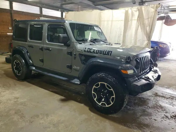 1C4HJXDN9KW629240 — 2019 Jeep Wrangler, фото 4 с аукциона Copart, Боковая часть