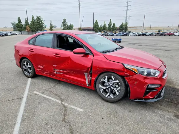 3KPF24AD6ME294627 — 2021 Kia Forte, фото 4 с аукциона Copart, Боковая часть