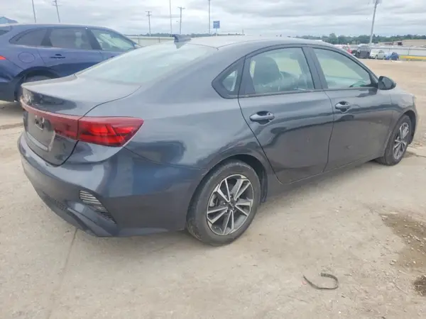 3KPF24AD7PE521814 — 2023 Kia Forte, фото 3 с аукциона Copart, Боковая часть