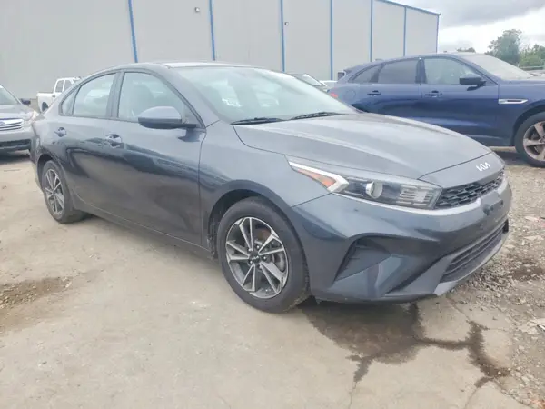 3KPF24AD7PE521814 — 2023 Kia Forte, фото 4 с аукциона Copart, Боковая часть
