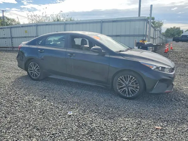 3KPF54AD3PE578874 — 2023 Kia Forte, фото 4 с аукциона Copart, Боковая часть