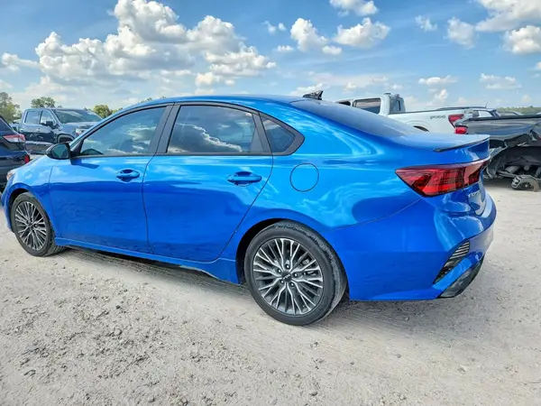 3KPF54AD5PE647810 — 2023 Kia Forte, фото 2 с аукциона Copart 02.10.2026, Боковая часть