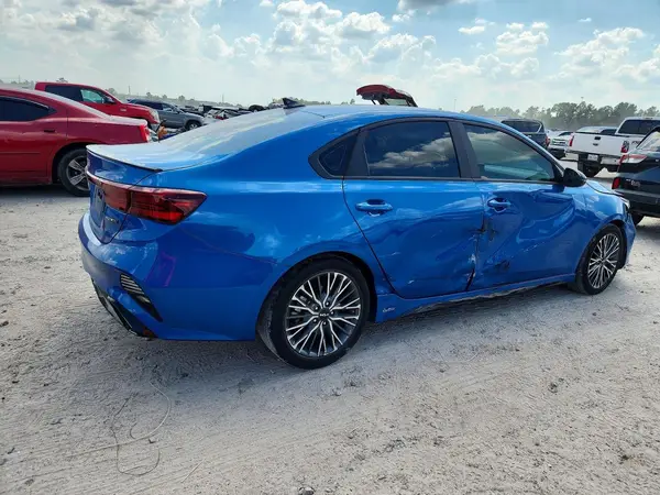 3KPF54AD5PE647810 — 2023 Kia Forte, фото 3 с аукциона Copart 02.10.2026, Боковая часть