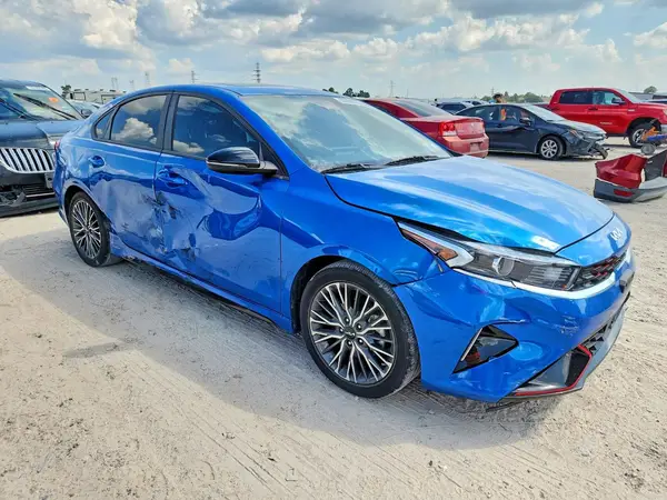 3KPF54AD5PE647810 — 2023 Kia Forte, фото 4 с аукциона Copart 02.10.2026, Боковая часть