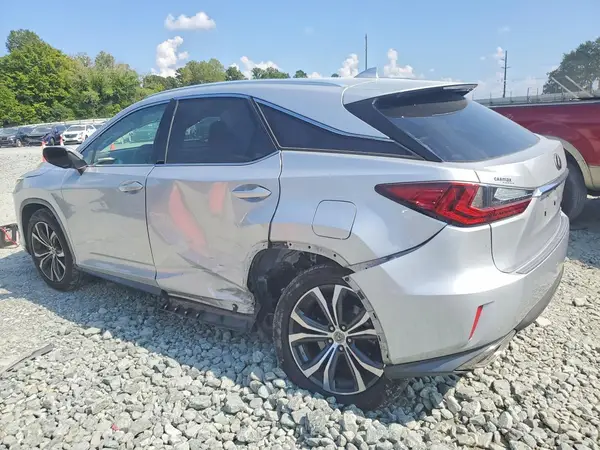 2T2BZMCAXHC104695 — 2017 Lexus RX, фото 2 с аукциона Copart 07.10.2026, Боковая часть