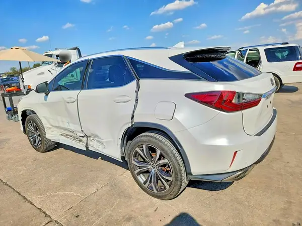 2T2ZZMCA5JC093674 — 2018 Lexus RX, фото 2 с аукциона Copart, Боковая часть