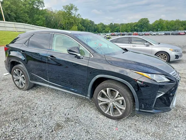 2T2BZMCA4KC179903 — 2019 Lexus RX, фото 4 с аукциона Copart, Боковая часть