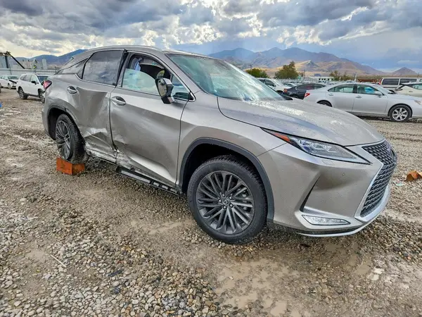 2T2JGMDA6MC061760 — 2021 Lexus RX, фото 4 с аукциона Copart, Боковая часть